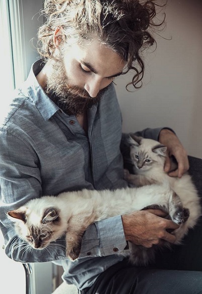 Cute guy and two cats