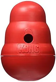 Kong Wobbler food-dispensing puzzle toy to stop a dog's whining