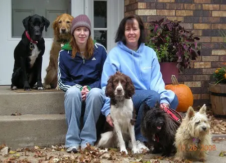 My mom and I and our "pack of dogs" Five dogs and two humans
