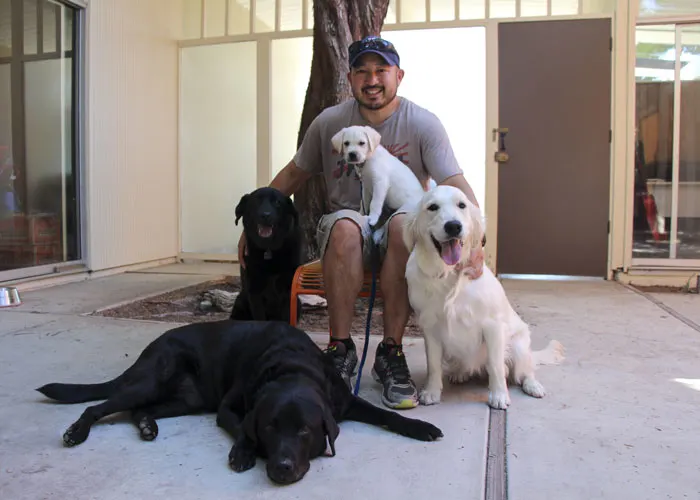 Colby and dogs Stetson, Linus, Archer and Raven