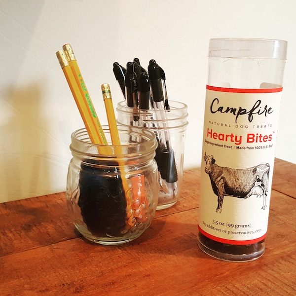 I keep a jar of Hearty Bites dog treats on my desk
